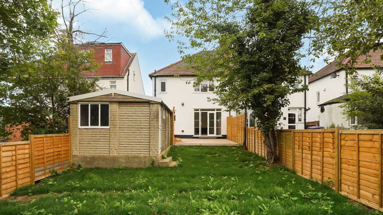 Spacious landscaped rear garden in Harrow family home for sale by Empire Chase.