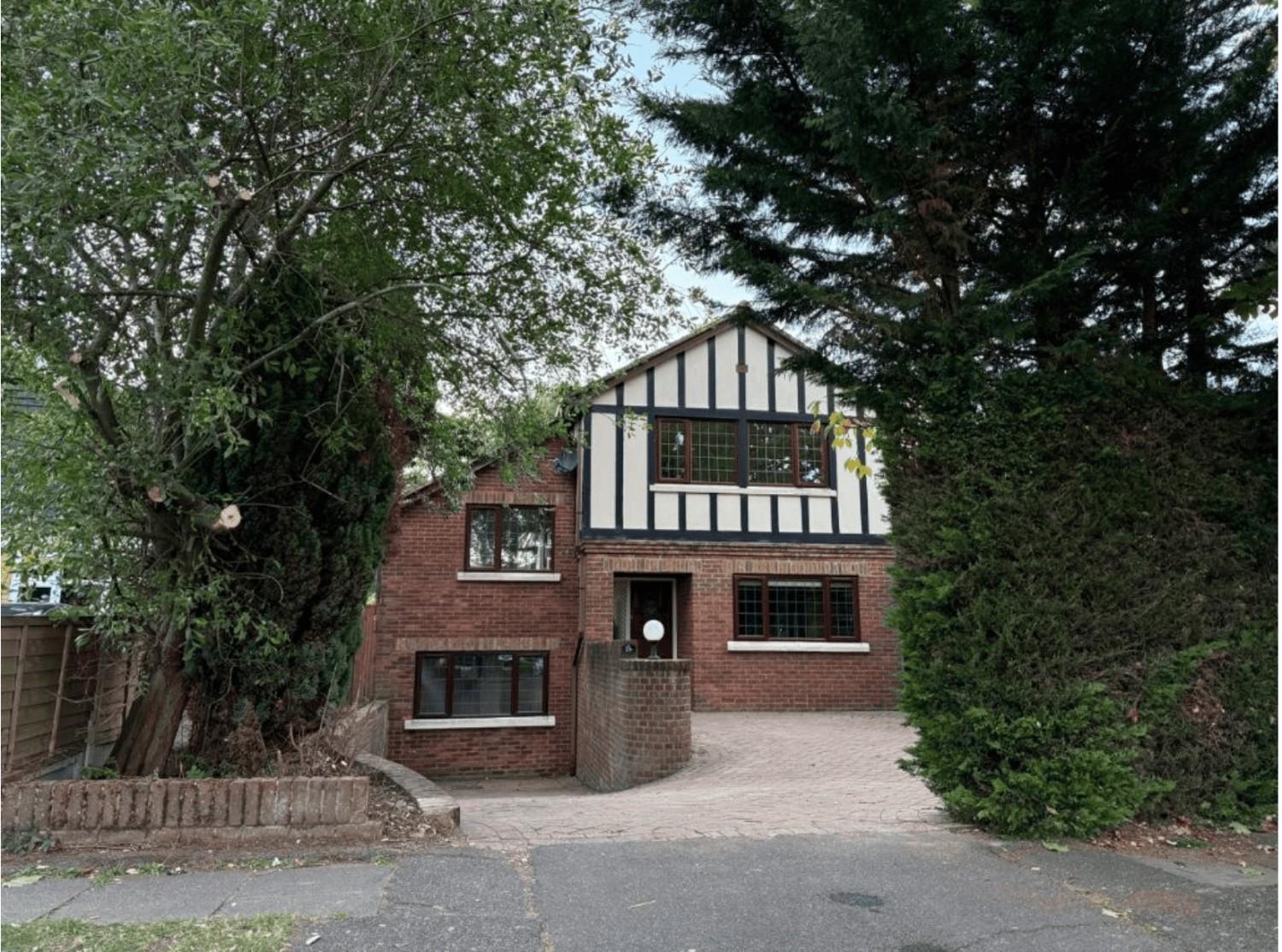 Front elevation of detached brick and timber-style home on Cheney Street, HA5 2TG.